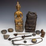 A lot of various Asian items including Siri boxes, a woven container, a Buddha and an opium pipe.