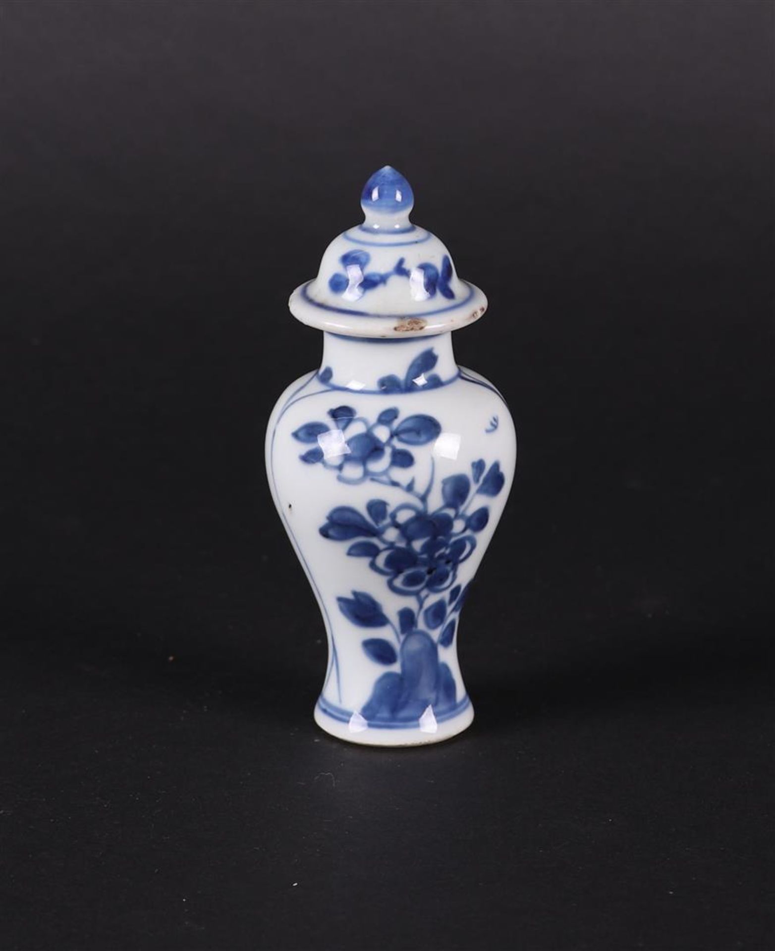 A porcelain baluster-shaped lidded vase with a 2-compartment division 