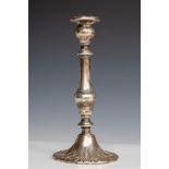 A sterling silver candlestick, 19th century. Gross weight 510 grams. (stuffed up).