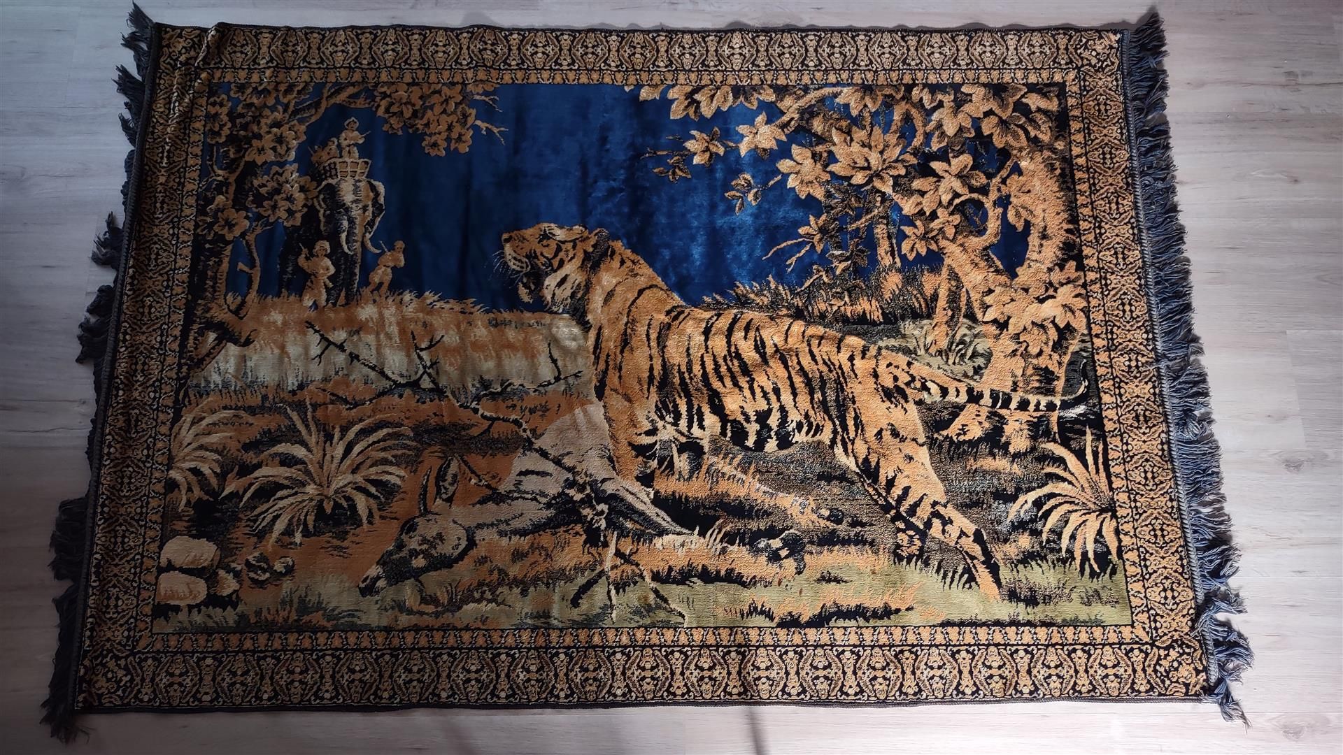 A machine-knotted tapestry depicting a tiger.