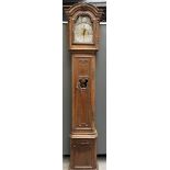 A richly carved so-called: "Liege clock", carved oak cabinet with LXVI motifs.