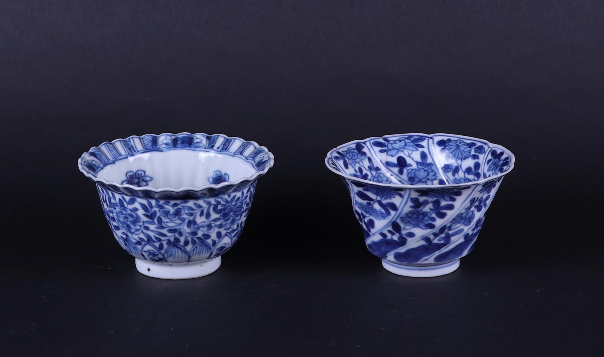 Two different porcelain bowls, one with twisted decoration, one model deep bowl.