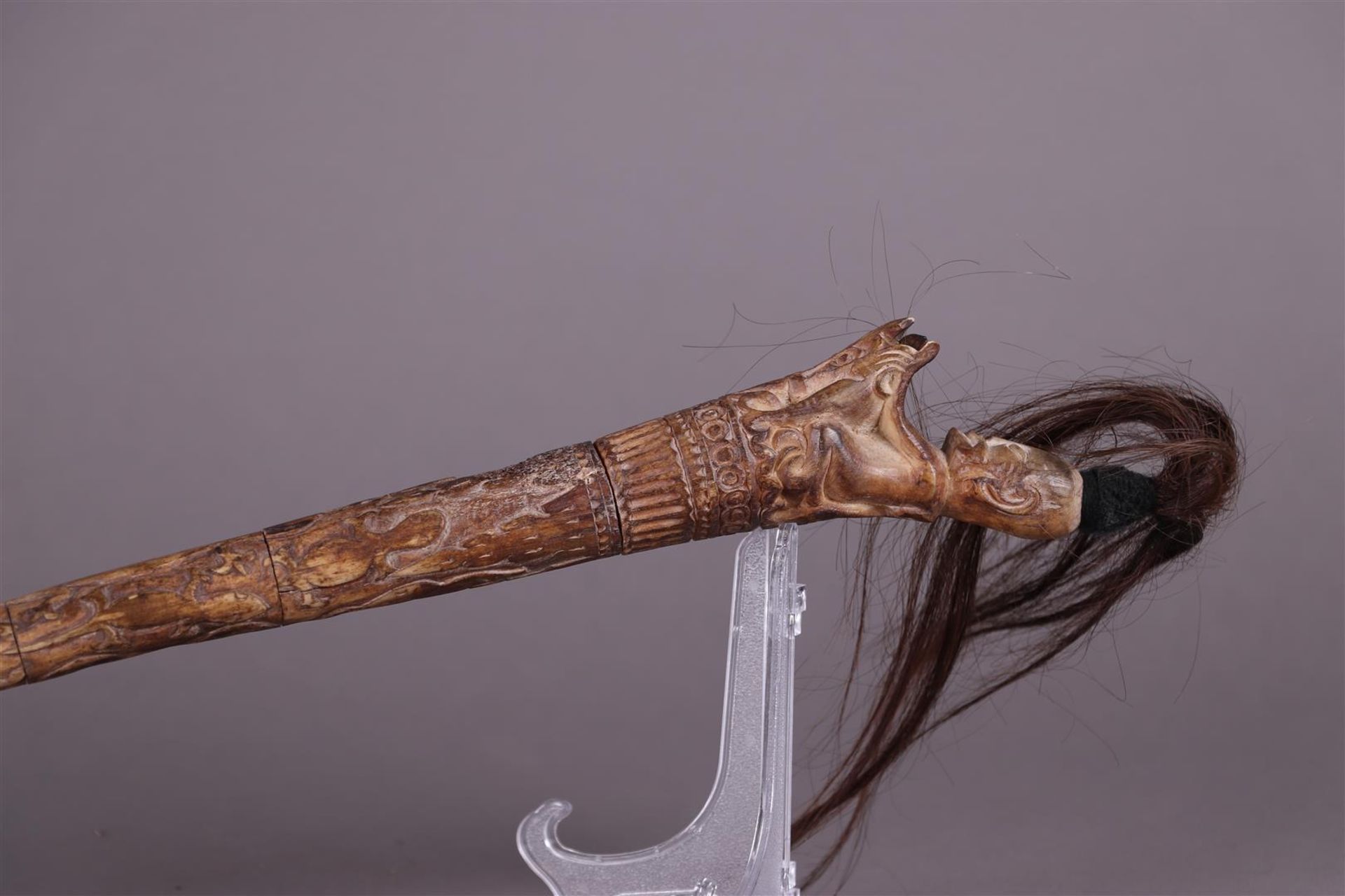 A richly carved bone septer. Nias Islands, Indonesia. - Image 2 of 4