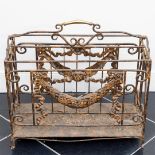 A wrought iron peat rack with garlands on the long sides. France, ca. 1880.