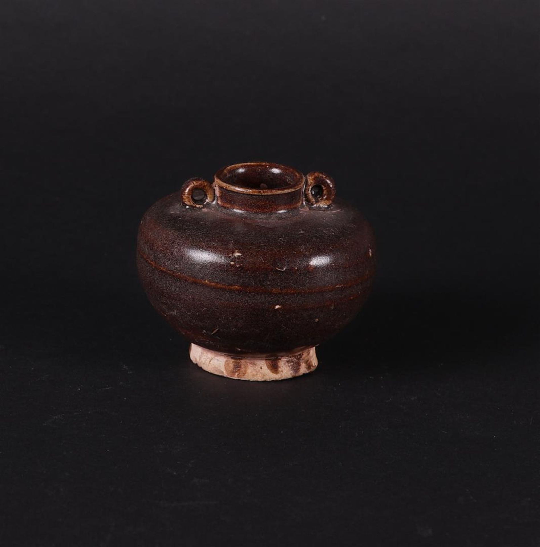 A brown stoneware storage jar with two looped ears. China early Ming. - Image 2 of 4