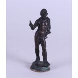 A bronze grand tour figurine depicting Narcissus. Circa 1900.