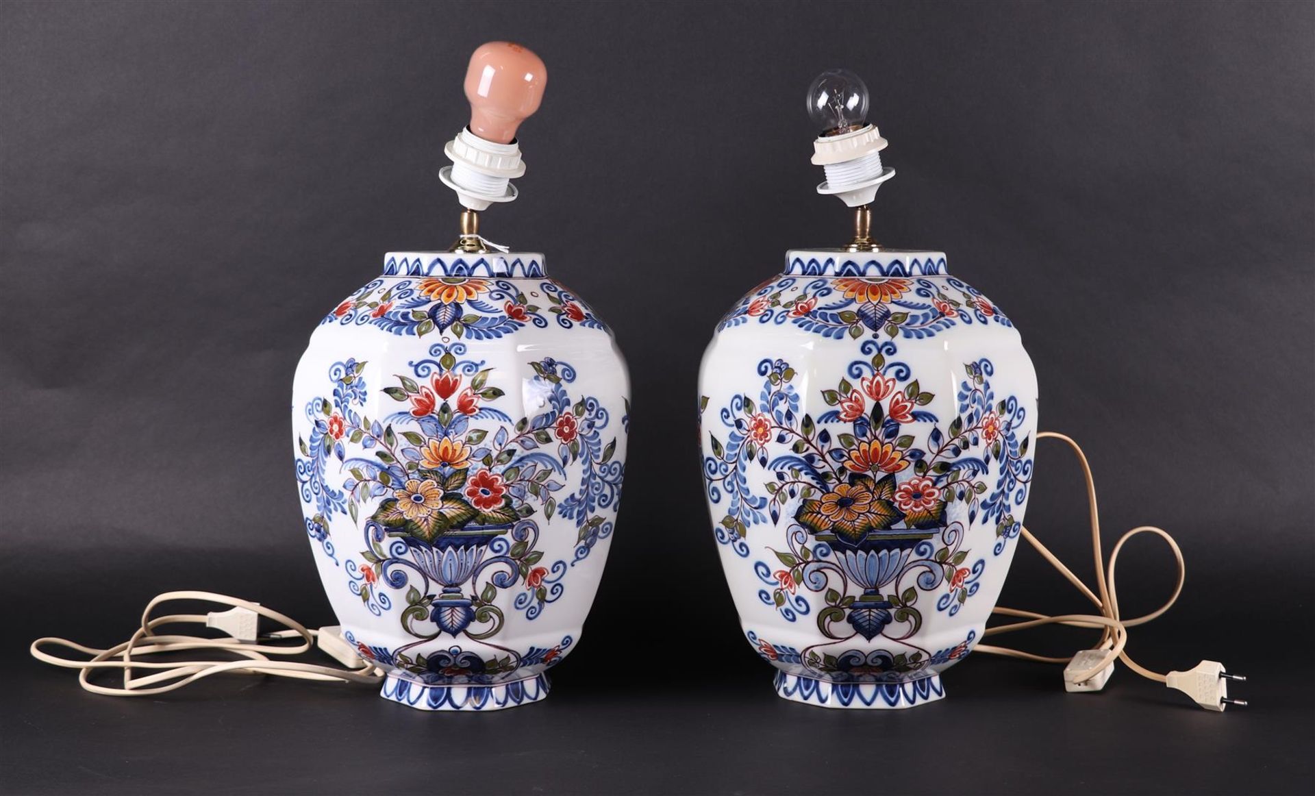 A set of two earthenware polychrome painted table lamps, Koninklijke Tichelaar, Makkum.