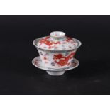 A porcelain Famile Rose lidded bowl with dish with dragon decor, marked Guanxu. China,