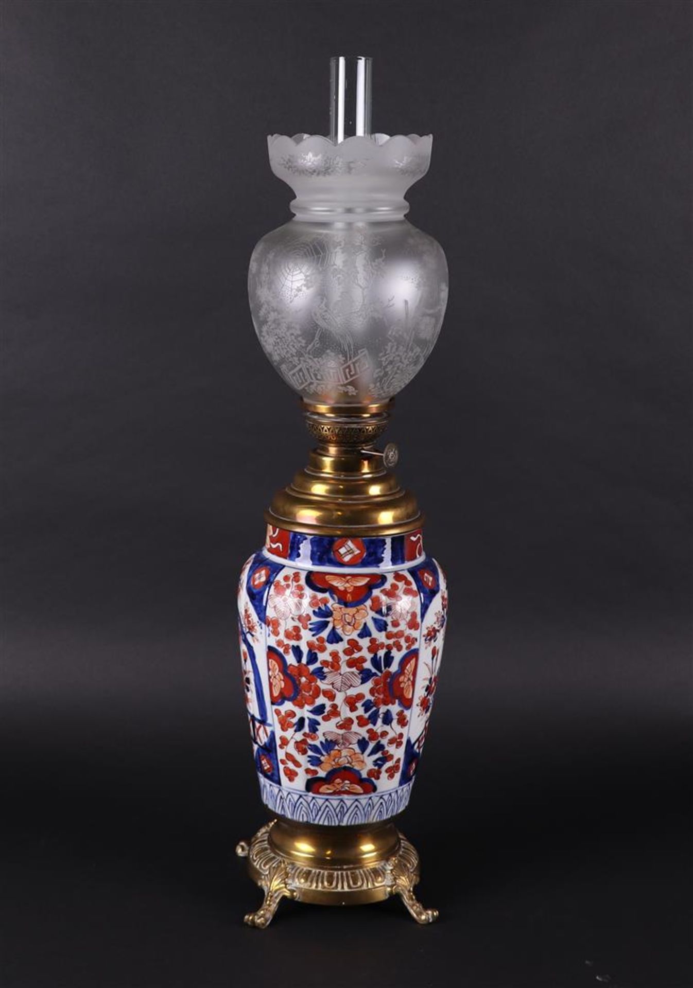 And a porcelain Imari vase converted into an oil lamp. Japan, 19th century.