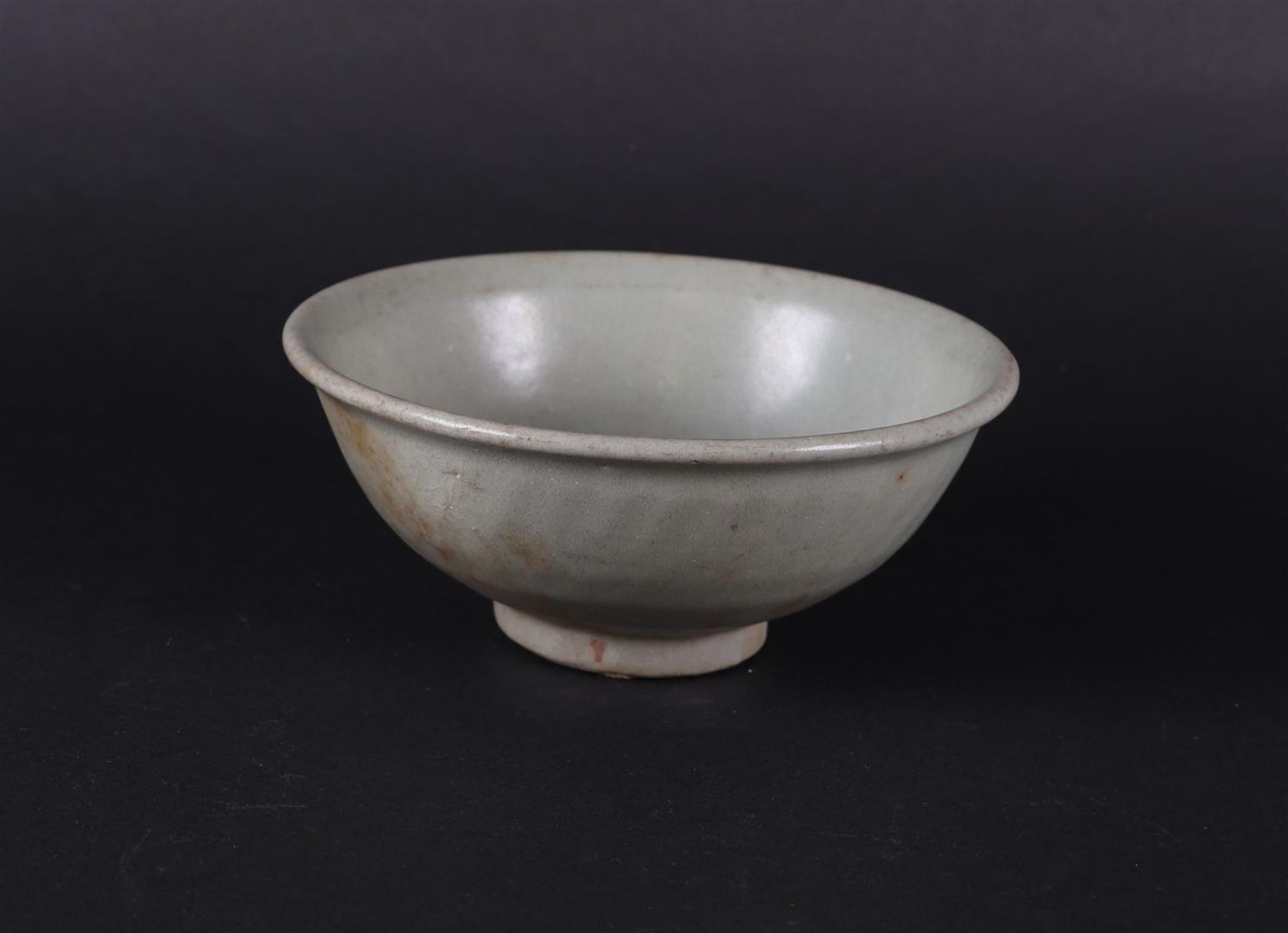 An unprocessed green/grey Celadon bowl. China Early Ming, period.