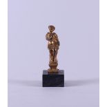 A French patinated bronze desk ornament depicting a Roman emperor.