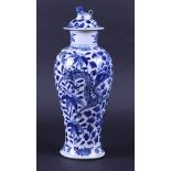 A porcelain baluster vase decorated with dragons, marked Kangxi. China, 19th century.