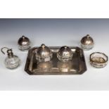 A lot consisting of various glass objects with silver lids on a silver tray.