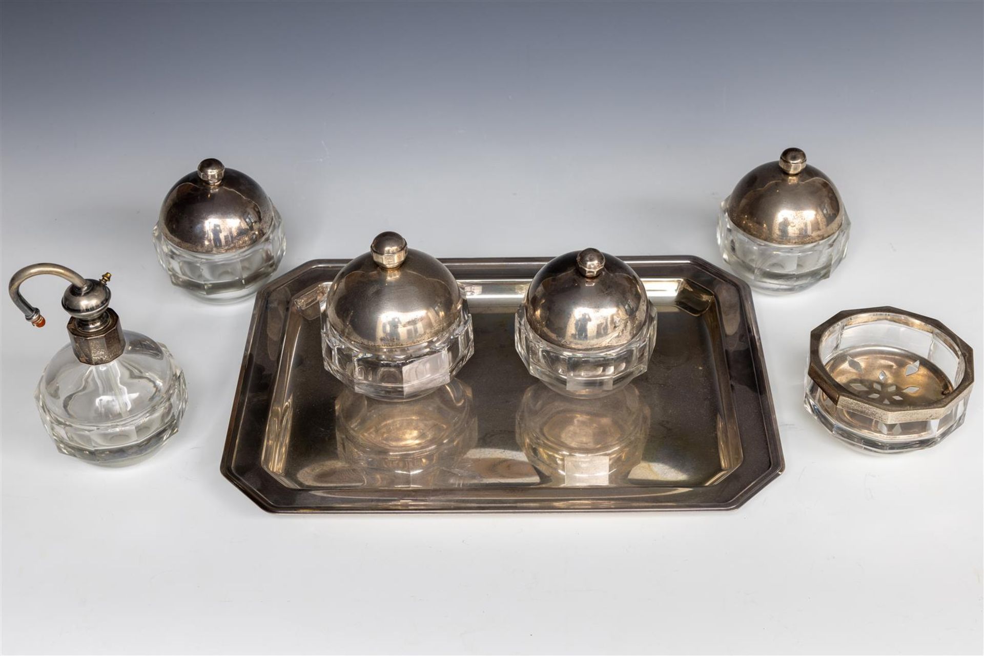 A lot consisting of various glass objects with silver lids on a silver tray.