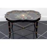 A Chinoiserie side table / tea table with loose leaf.