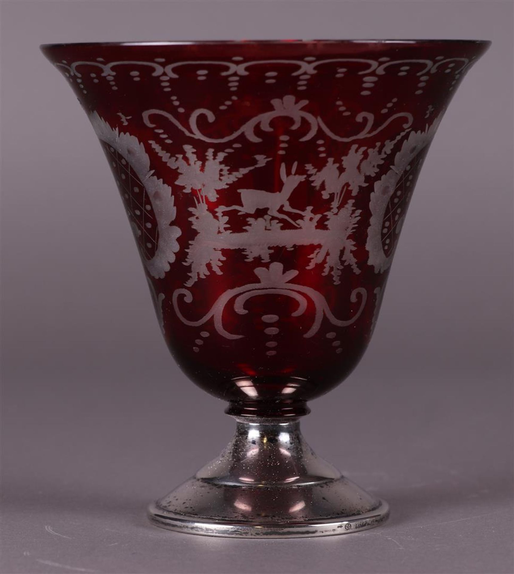 A Bohemian goblet on a silver base, ca. 1900.