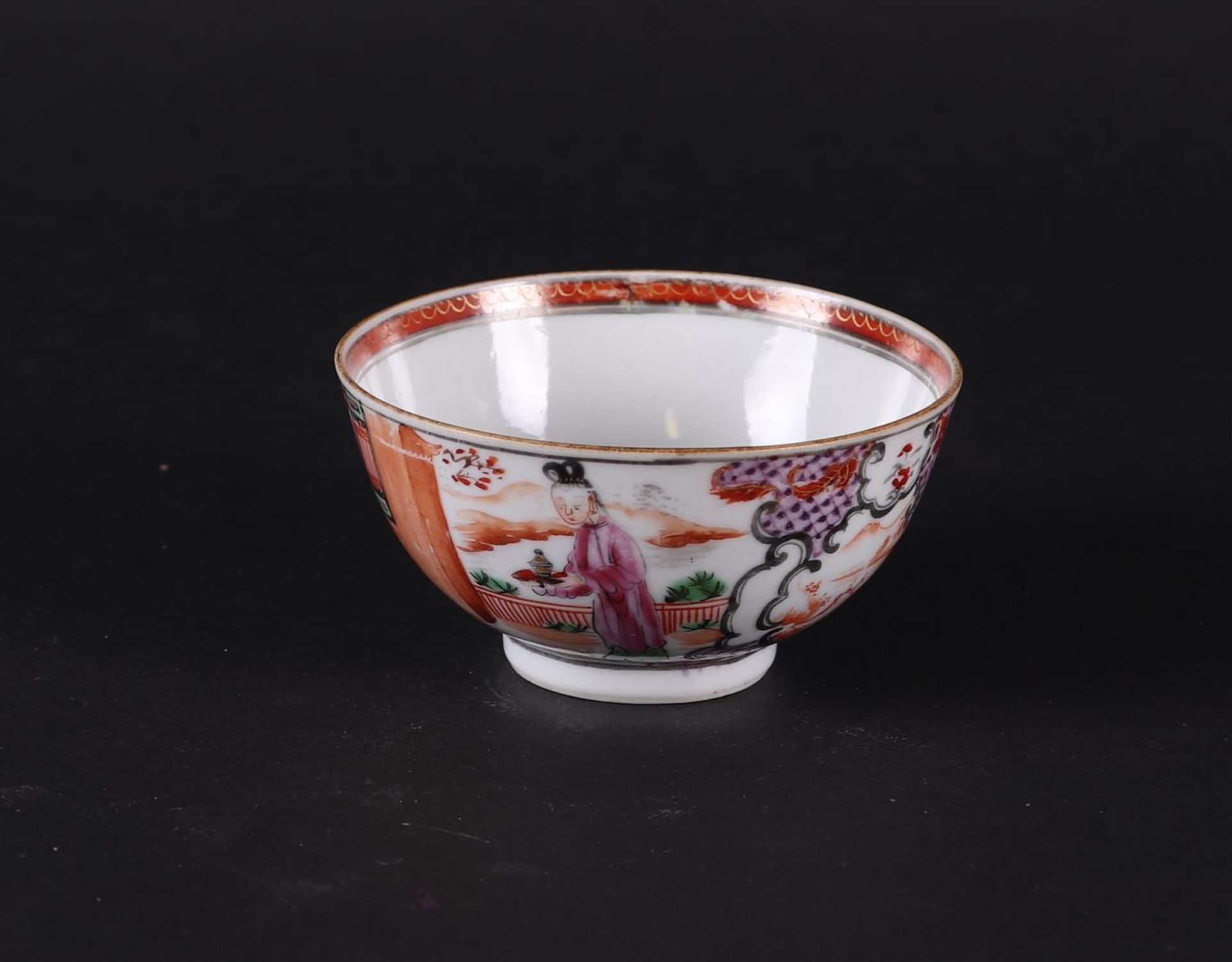 A porcelain Famille Rose bowl (Manderin) with landscapes and figures in compartments . 