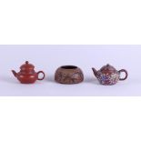 A lot of Yixing pottery including two teapots, a lid (non matching). China, 19/20th century.