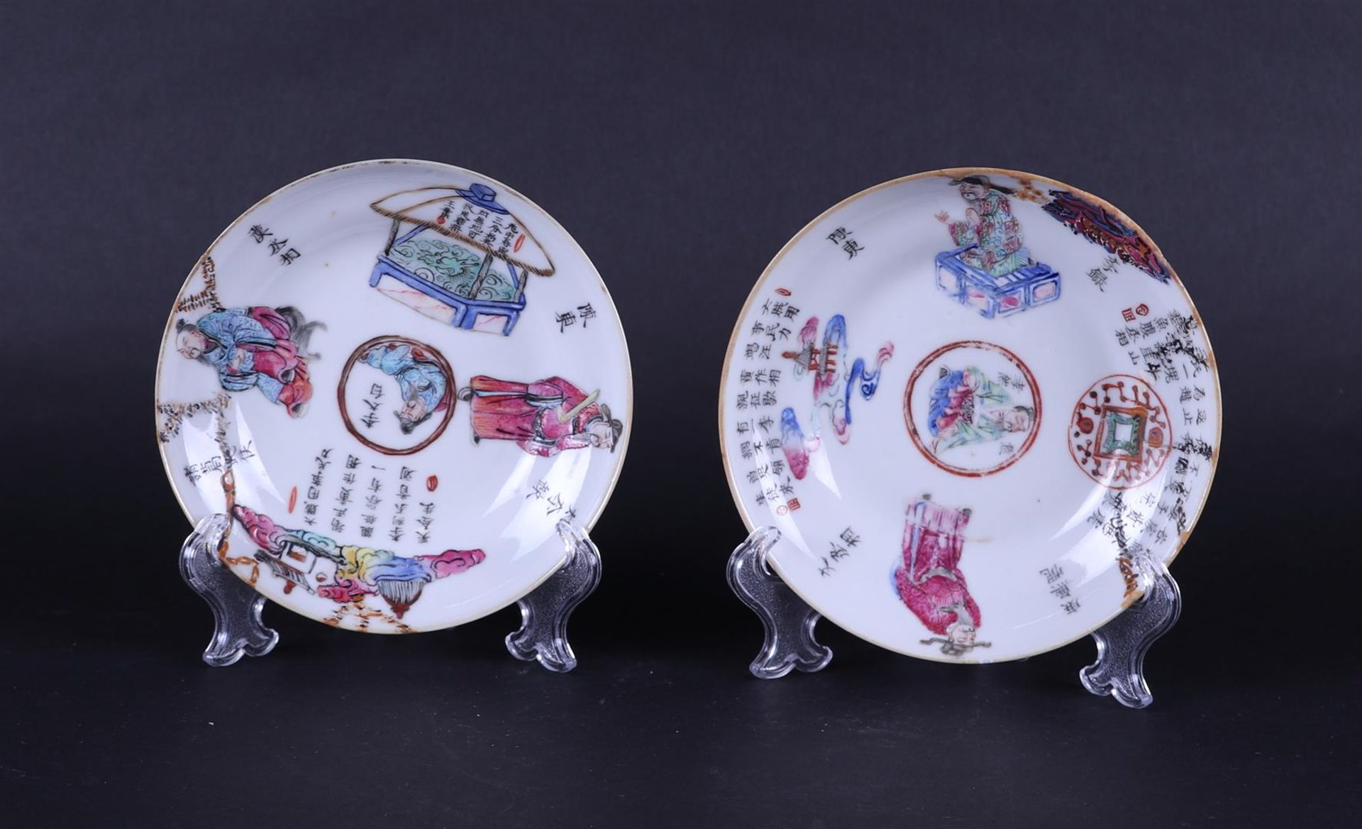 Two porcelain saucers Famille Rose with Wu Shuang Pu decoration. China, 19th century.