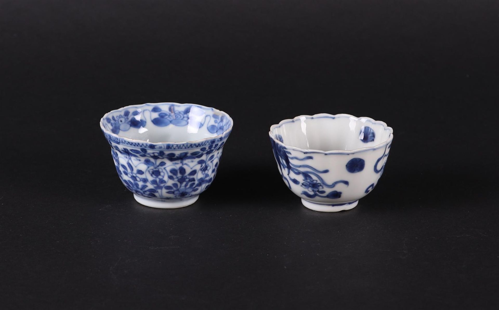 Two various contoured porcelain bowls, both with floral decoration, one marked. China, 