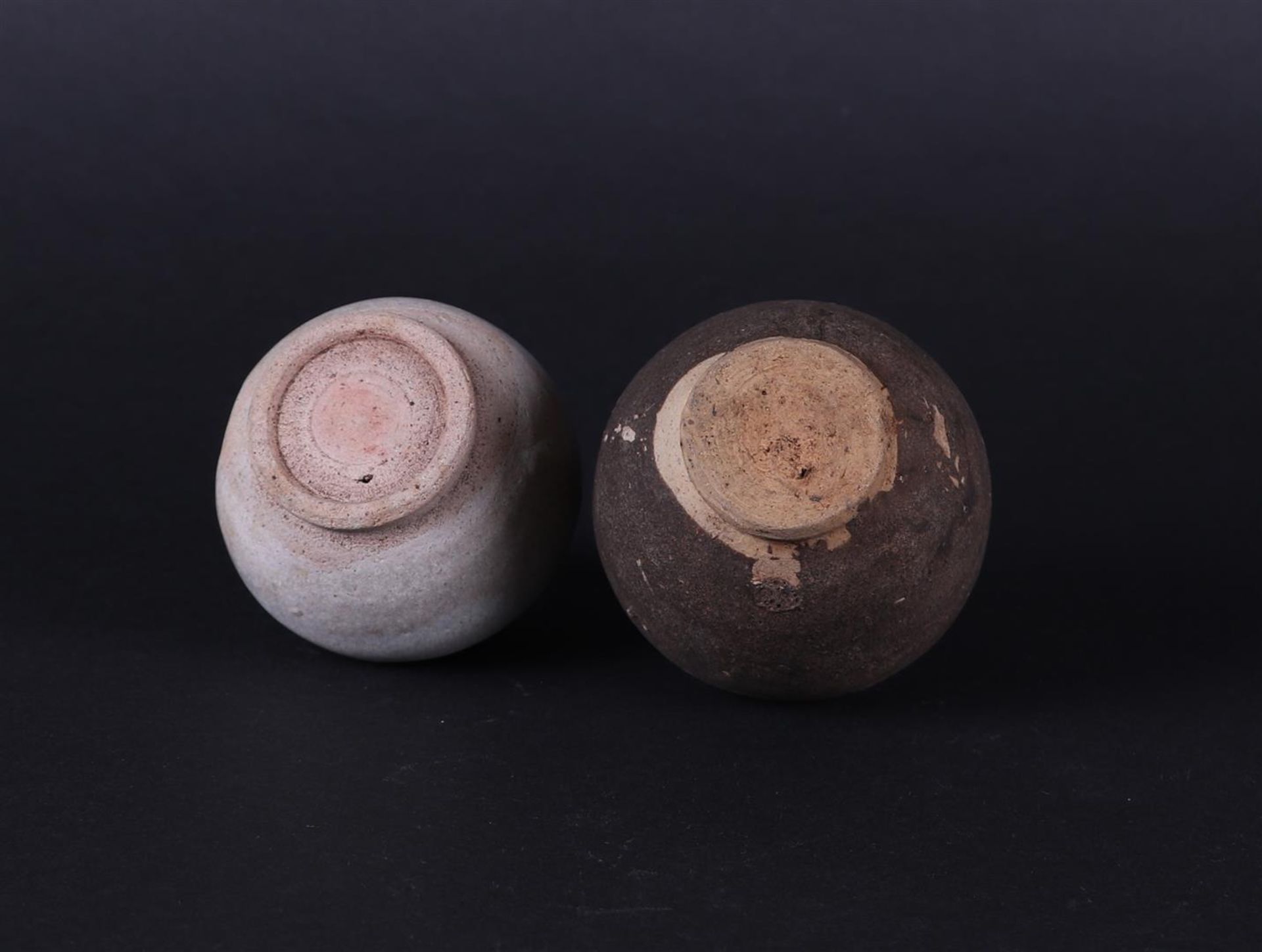 A set of stoneware storage jars. One grey, the other dark grey. China  early Ming. - Image 3 of 3