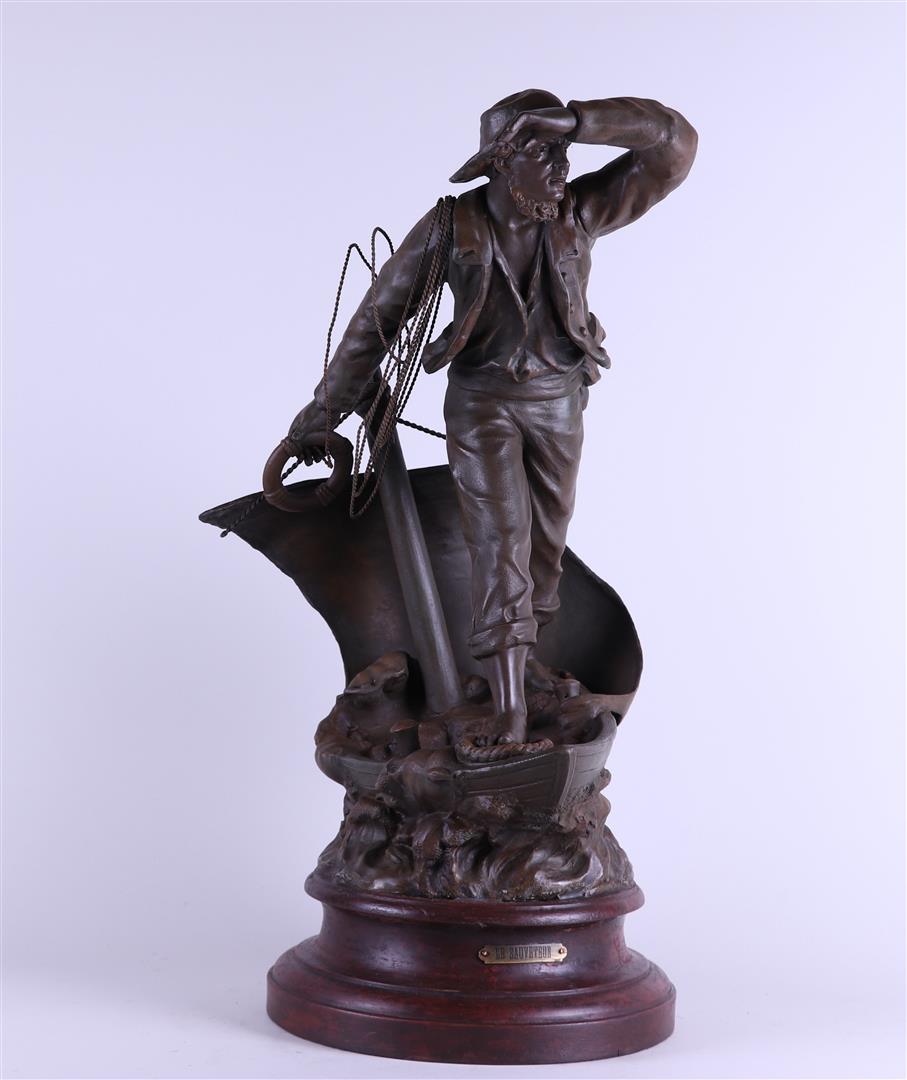 France ca. 1900, Le Sauvateur, A Zamac statue depicting a savior on a raging sea,