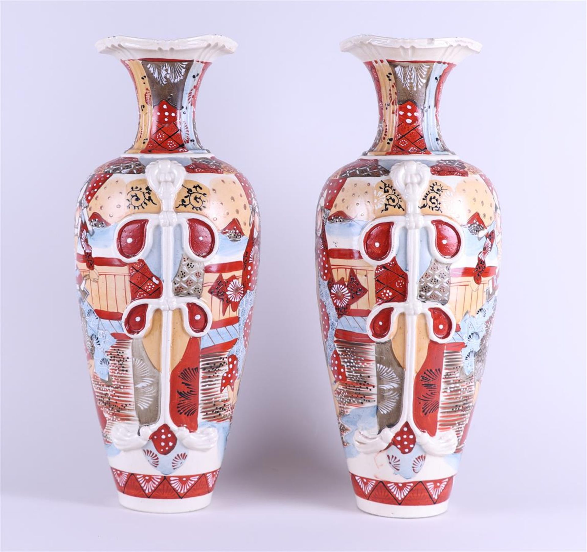 A set of two Satsuma earthenware vases decorated with various figures. Japan, circa 1900. - Image 2 of 4