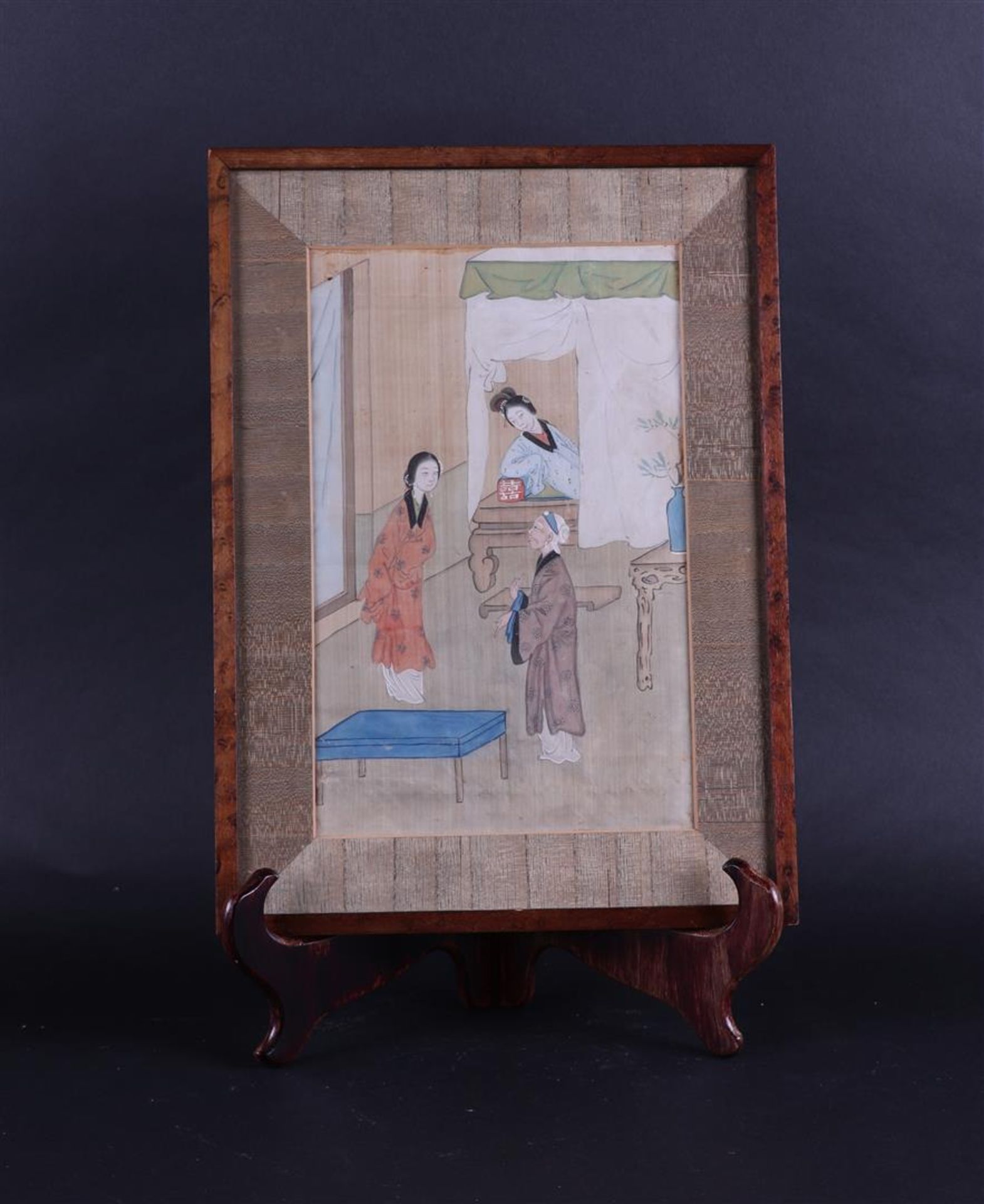A 19th century painting on silk depicting a scene of two ladies-in-waiting and a gentleman.