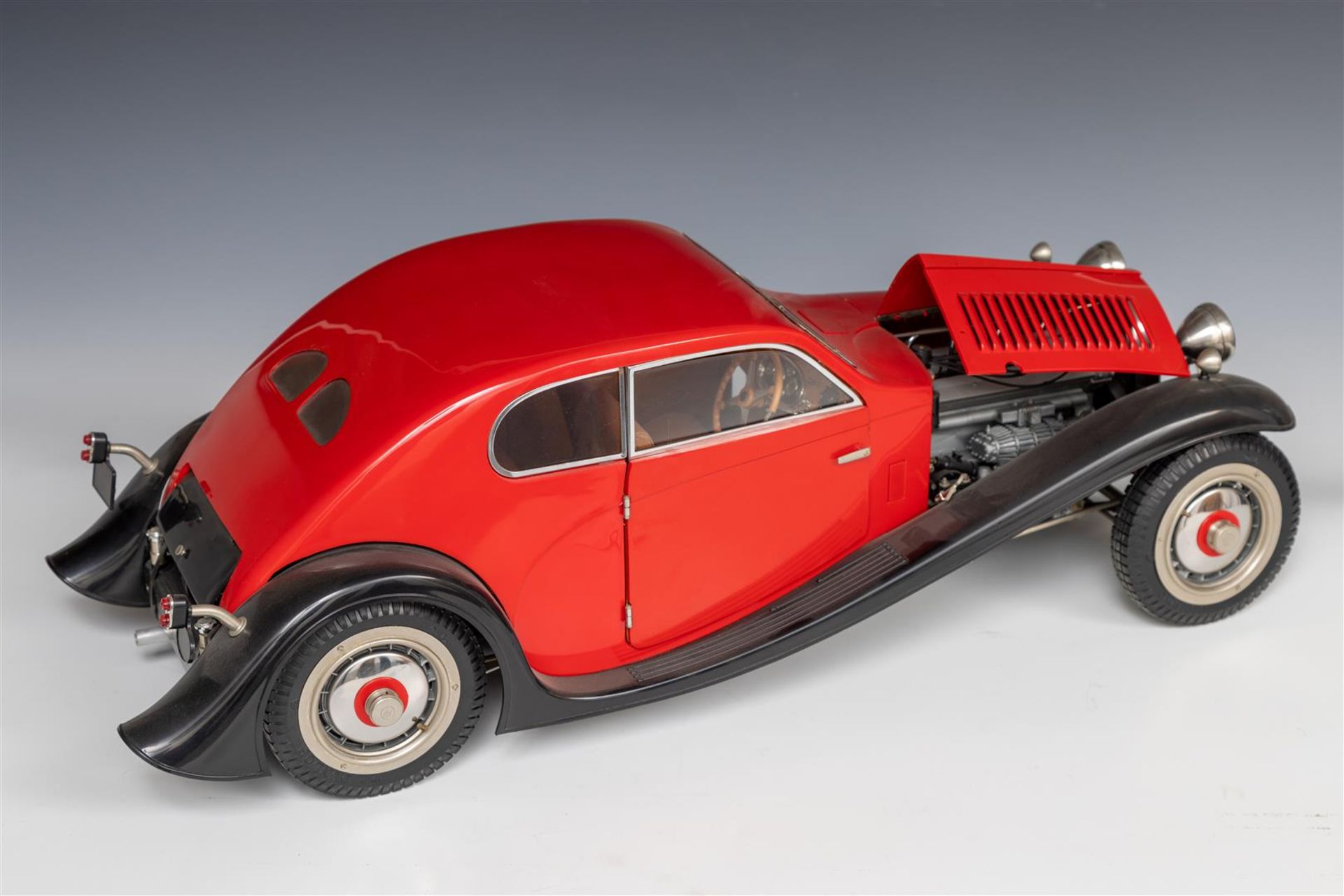 A large and extensive scale model of a Bugatti.