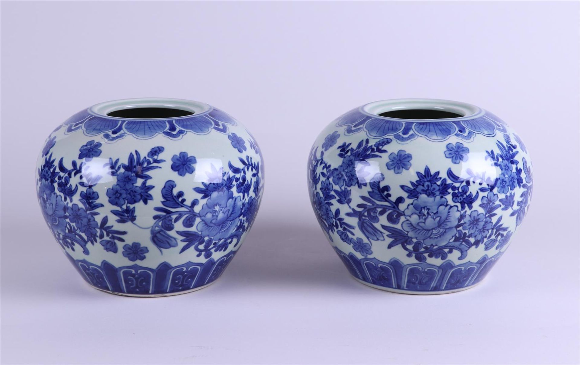 A set of (2)  porcelain storage jars. China, late 20th century. Lids not present. 