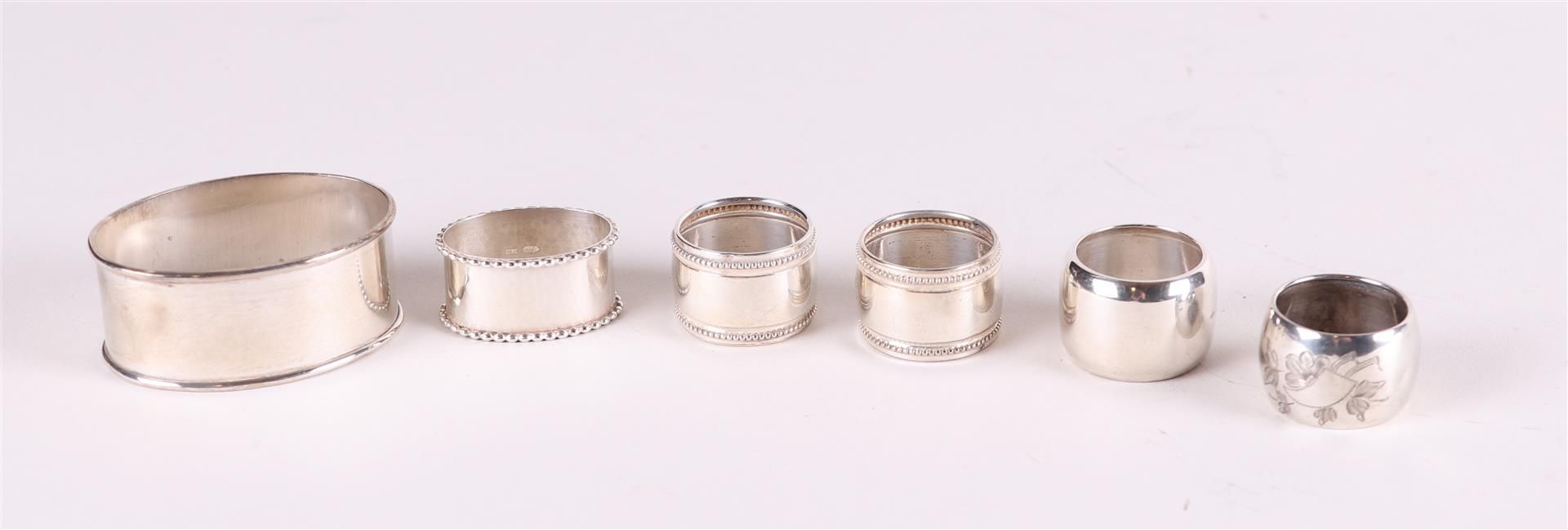 A lot of six silver napkin rings. 50 grams.