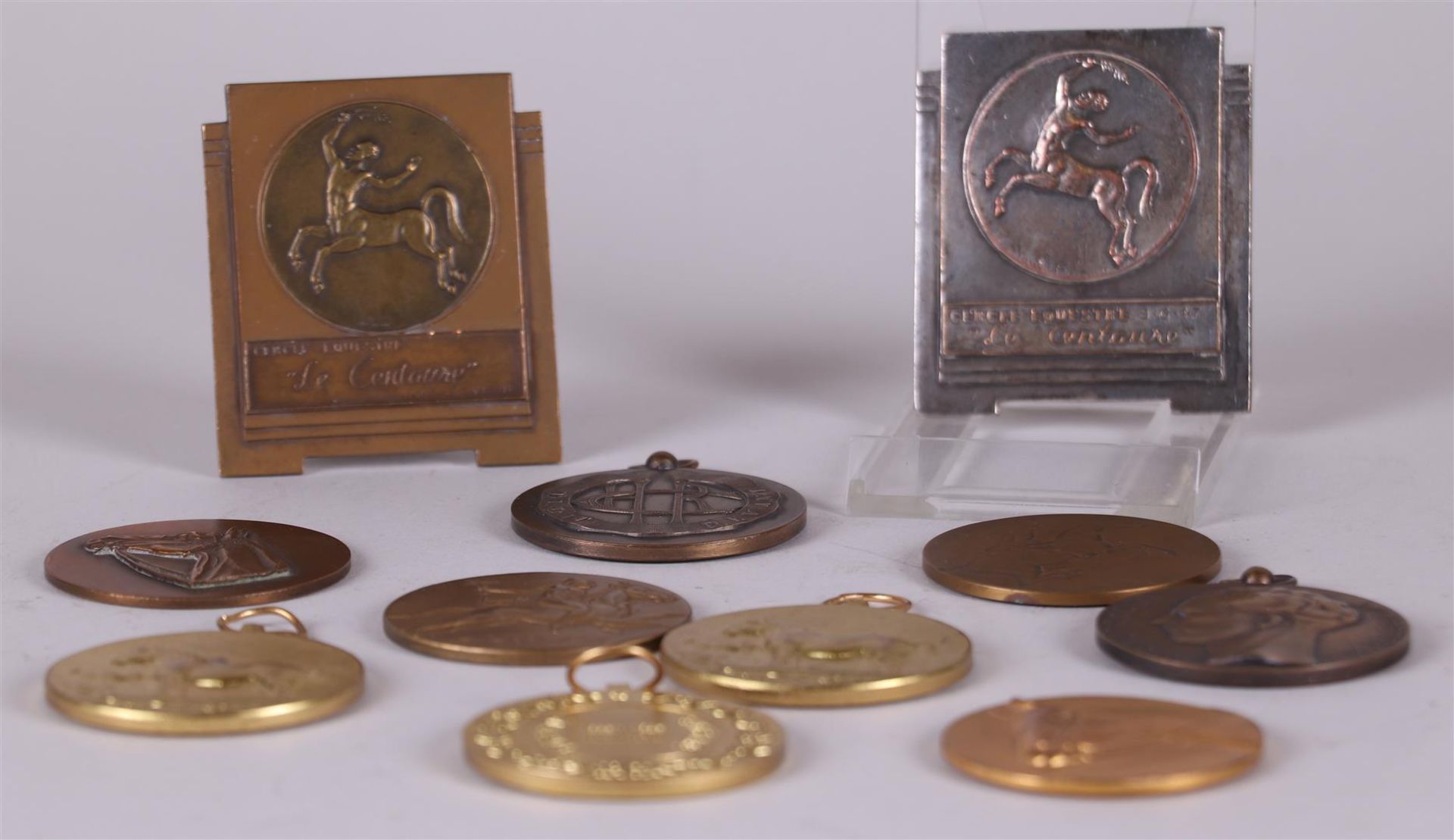 A lot of various bronze and copper equestrian medals.