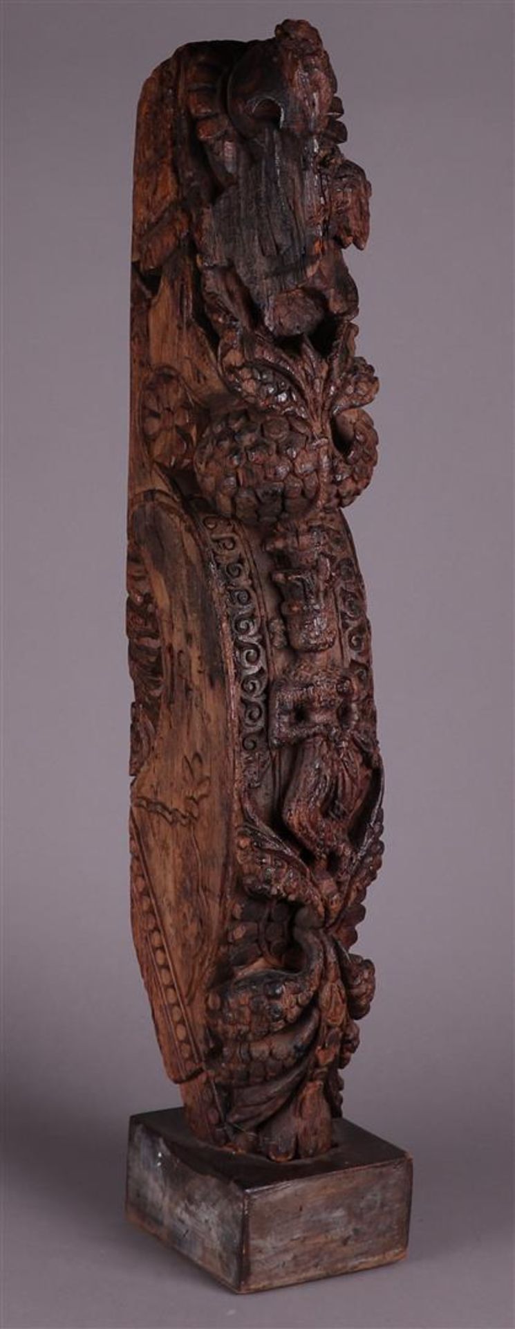 A richly carved wooden temple beam. India, 18th century or earlier.