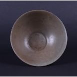 A celadon bowl with lotus relief. China, Yuan.