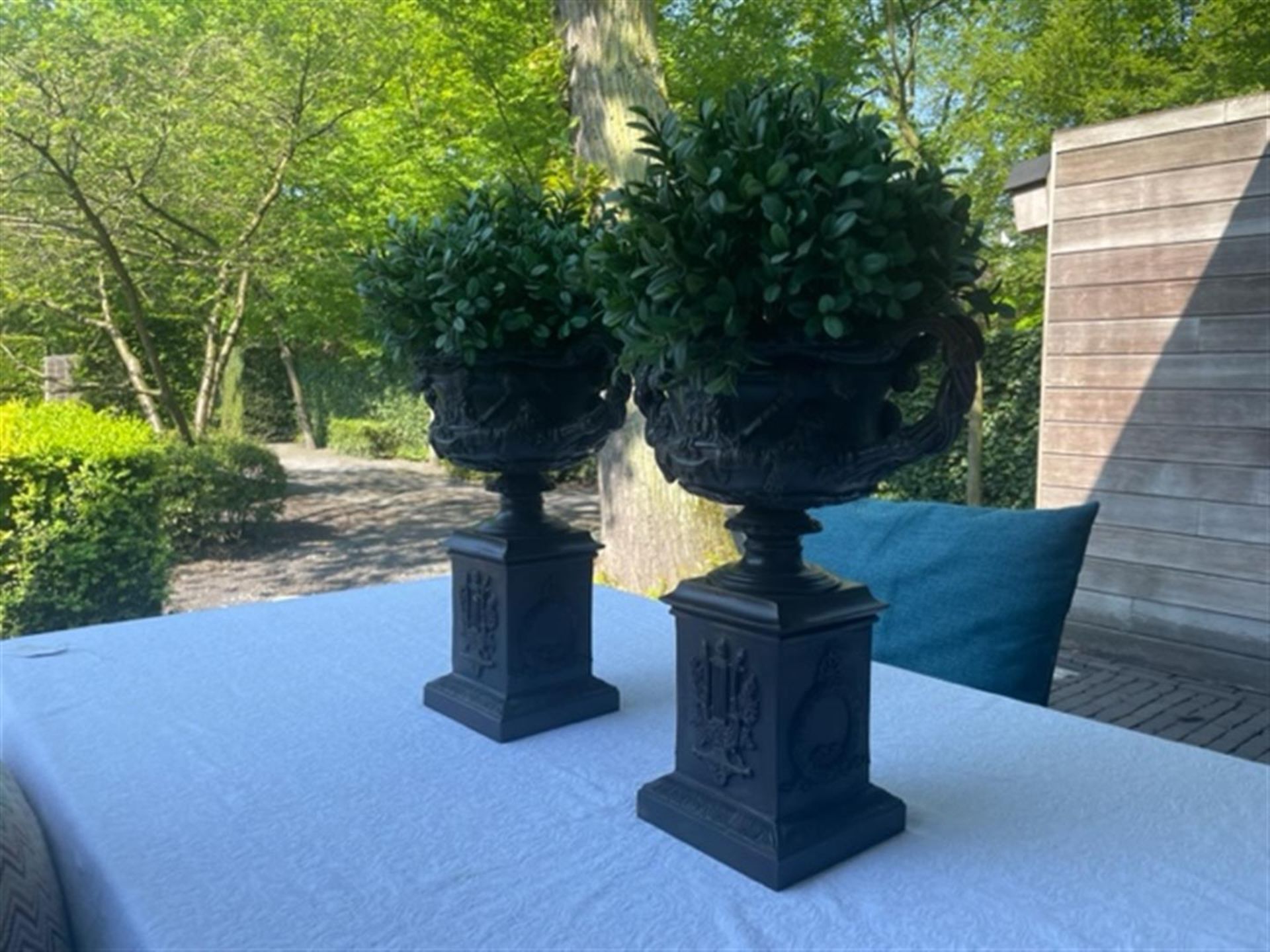 A lot consisting of (2) cast bronze vases after a classic example.