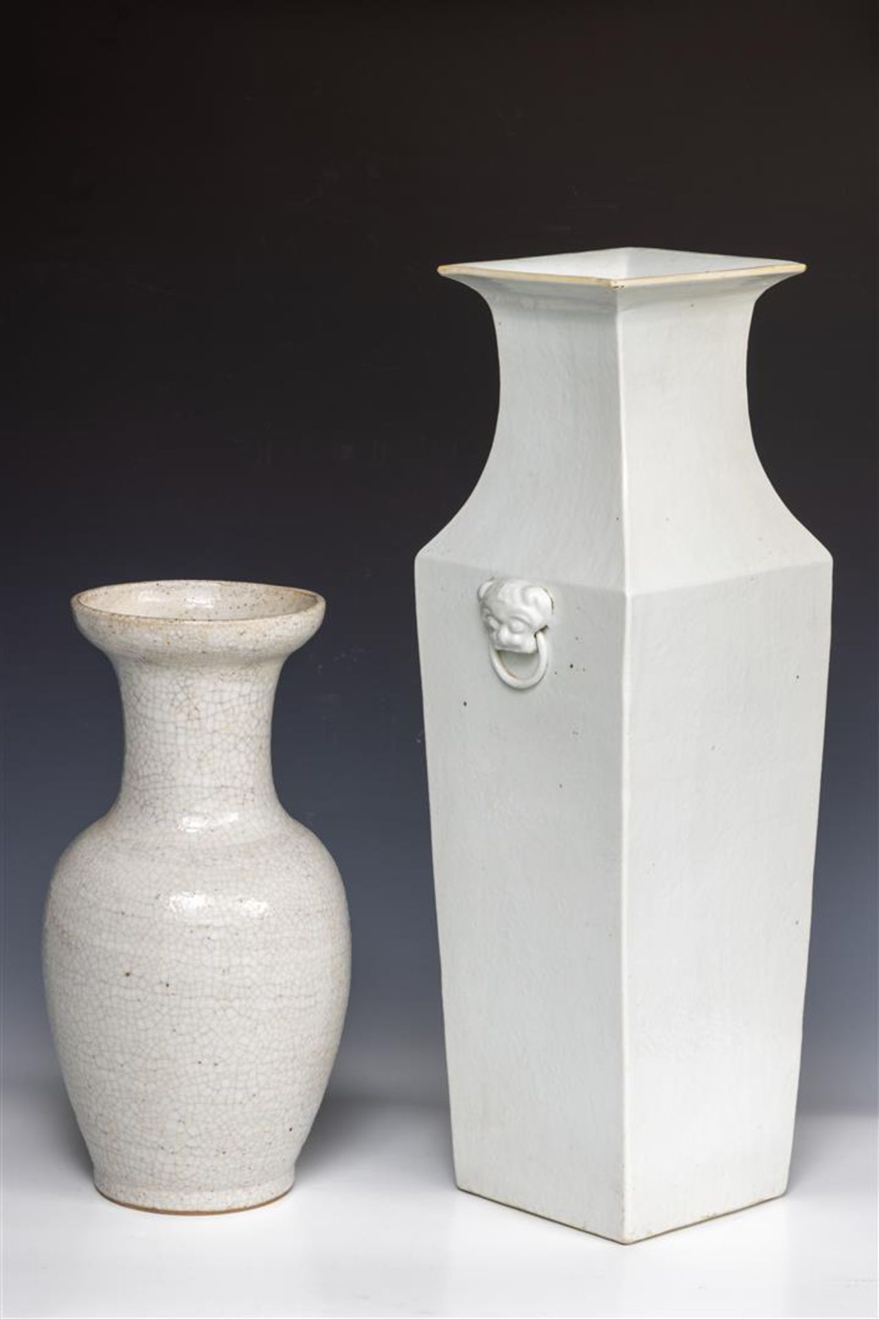 A lot consisting of (2) Chinese vases including a baluster vase and a crackle vase.