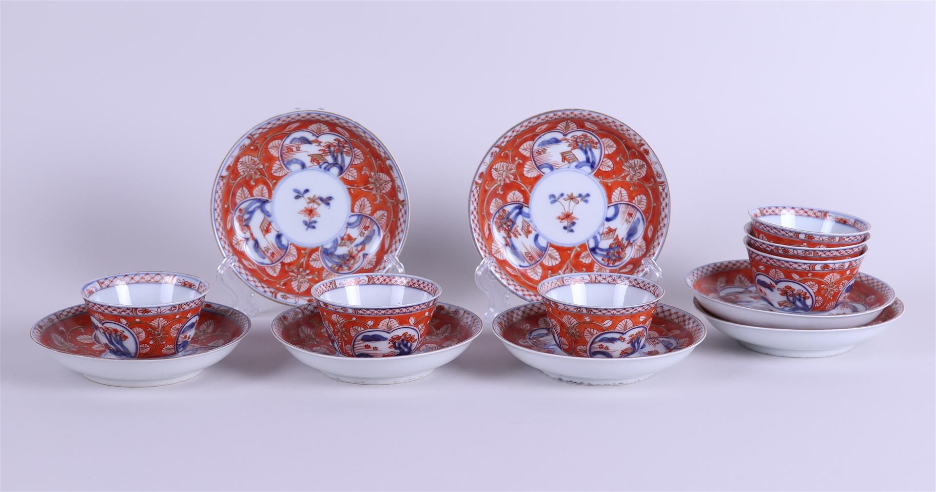 A set of (5) porcelain Imari cups and saucers with landscape decor in compartments. Japan, 