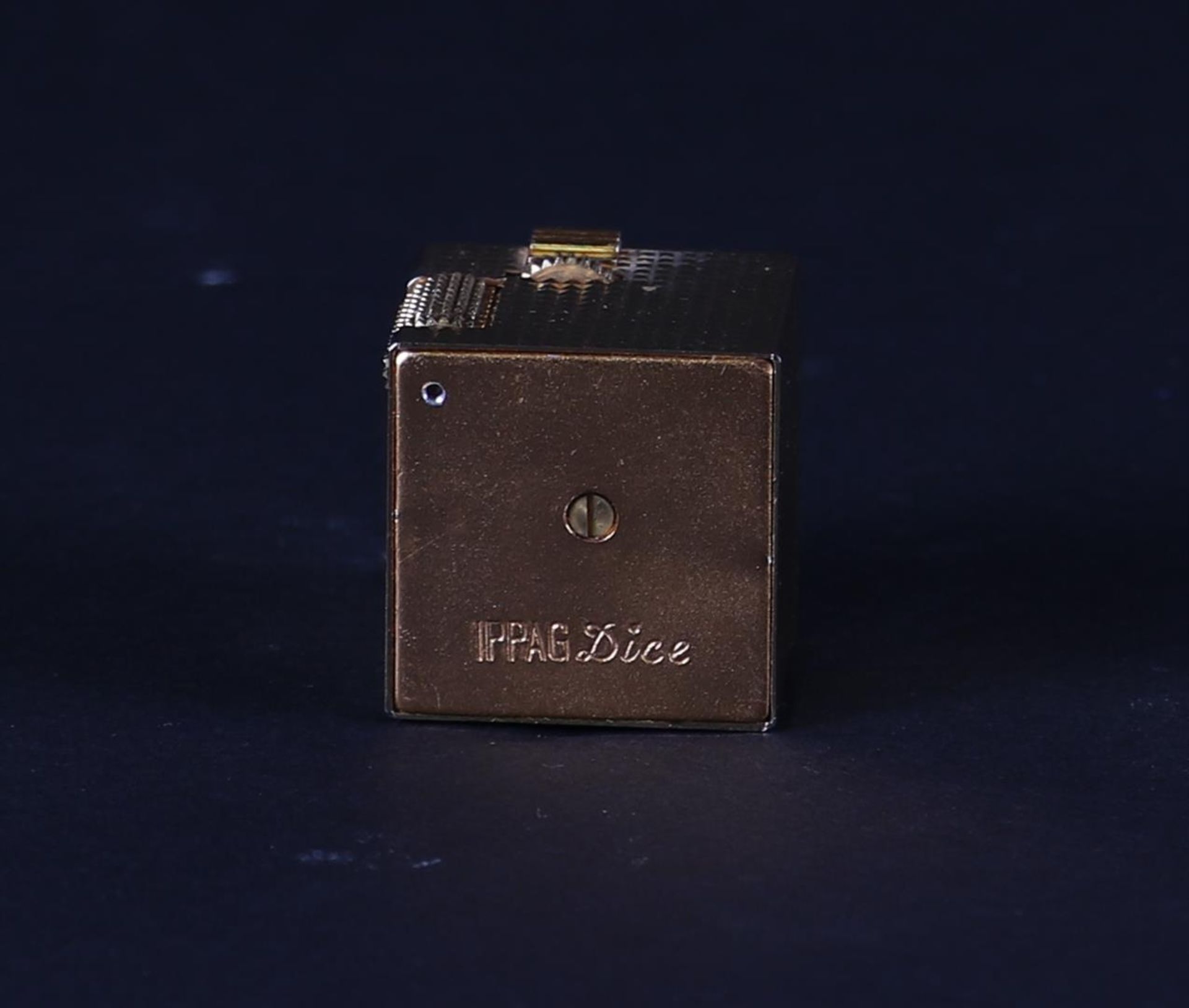 A Bucherer Ippag Dice lighter, ca. 1970. Lighter in original white case (ipag dice). - Image 4 of 4