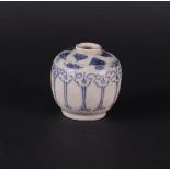 A stoneware small model cream jar with underglaze blue cloud decoration. China, 17th/18th century.