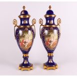 A set of two Sèvres-style porcelain vases with brass mounts. France, 20th century.