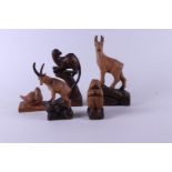 A folk art lot consisting of a Gems, a cougar on a stump, a beaver, a goat, and a duck.