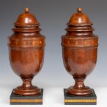 A pair of walnut casolettes with intarsia, ca, 1860.