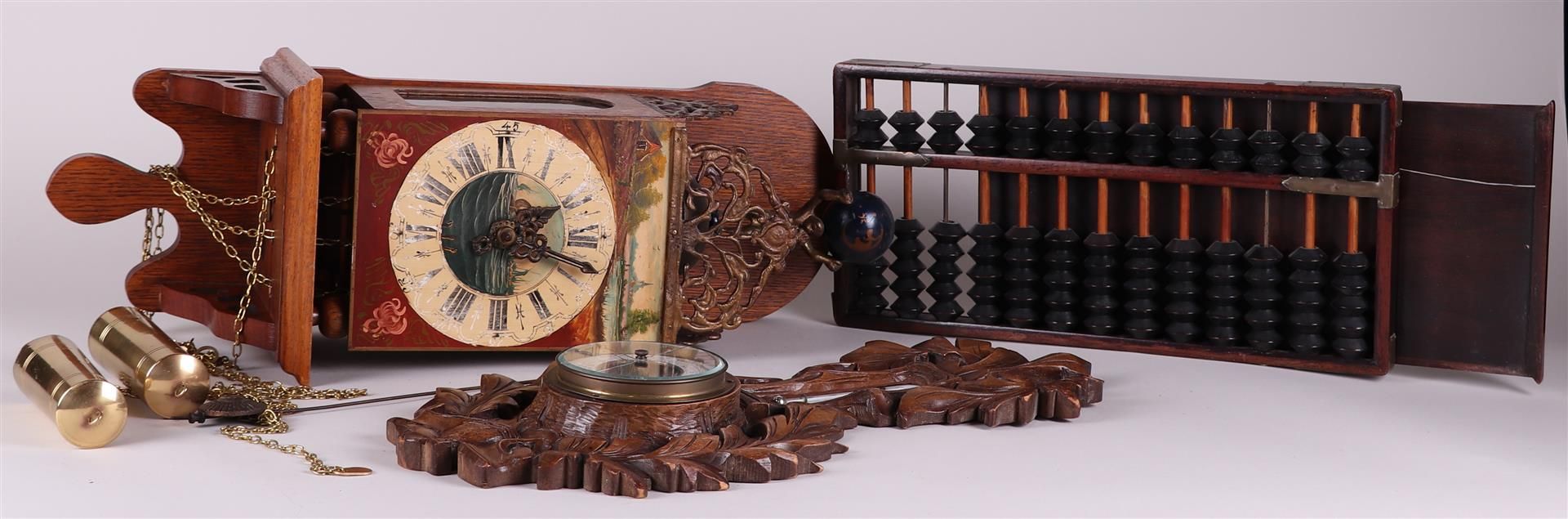 A lot consisting of a  clock, barometer and abacus.