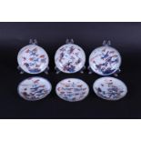 Six porcelain Imari plates with bird on bamboo branch and butterfly decor. China, Qianlong.