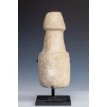 An antique marble sculpture of the phallus