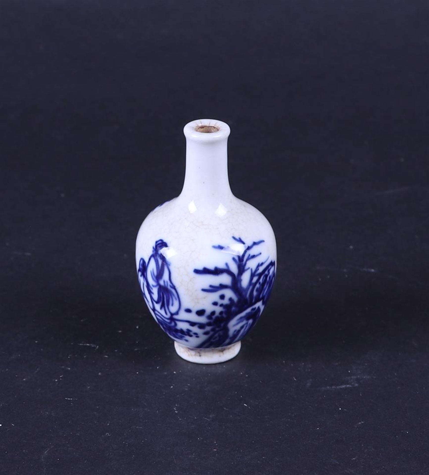 A small porcelain vase decorated with various figures. China, 18th century.