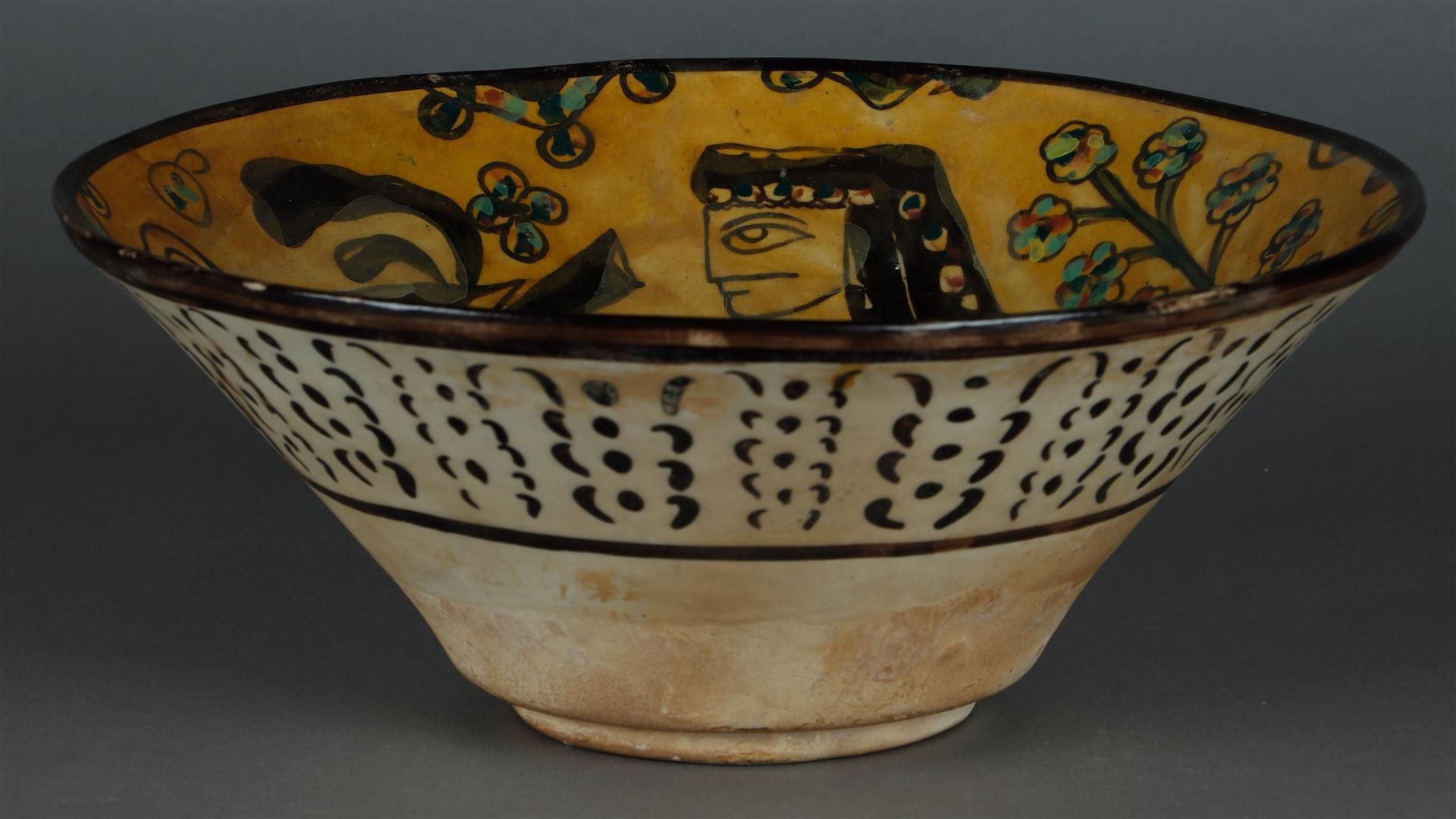 A pottery Nishapur painted bowl. Persia, probably 13th century.