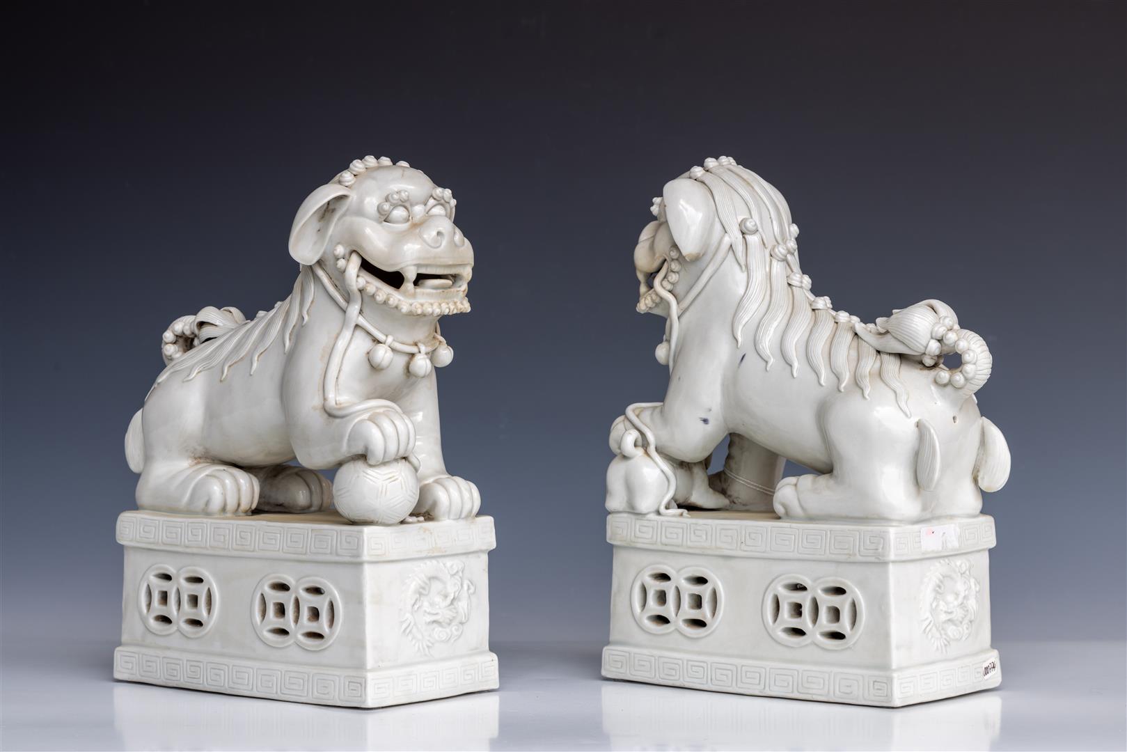 A set of (2) Blanc de Chine Foo-dogd, China, 20th century. - Image 2 of 2