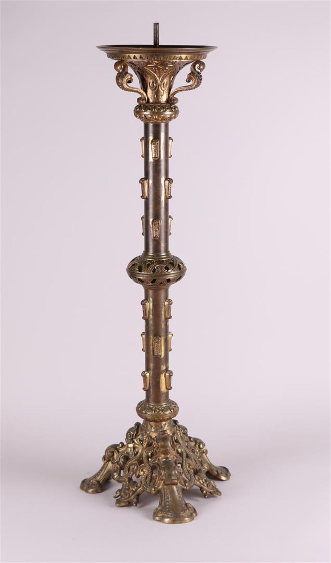 A large brass altar candlestick, ca. 1900.