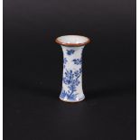 A porcelain cup vase with rich floral decoration, with birds in between. China, Yongzheng.